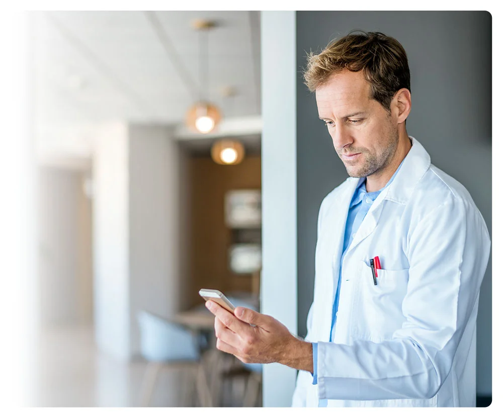 Healthcare iPhone Apps Doctor using an iPhone